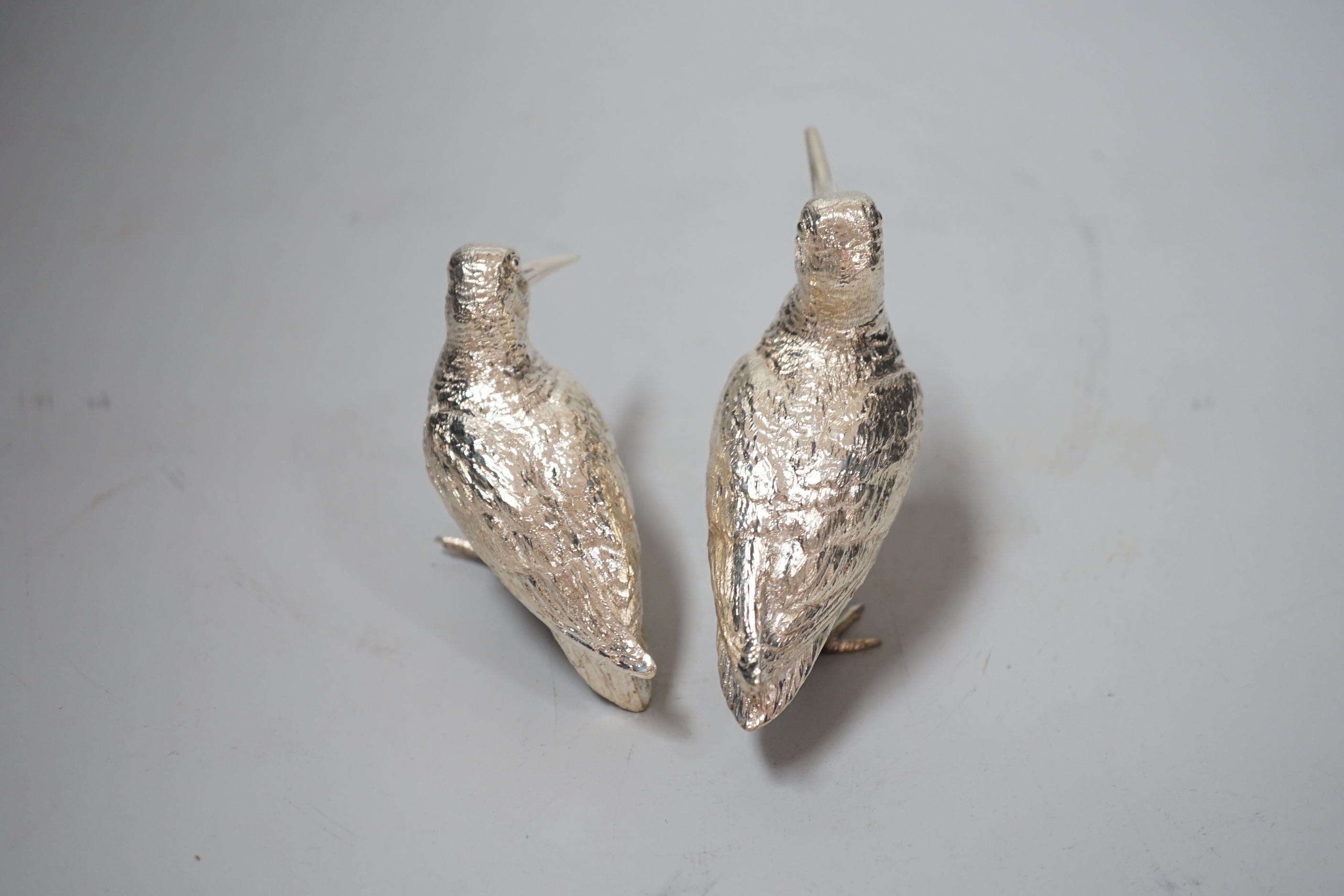 A pair of Elizabeth II silver model free-standing woodcocks, BSE Products, London, 2017, tallest 75mm, 10.5oz.